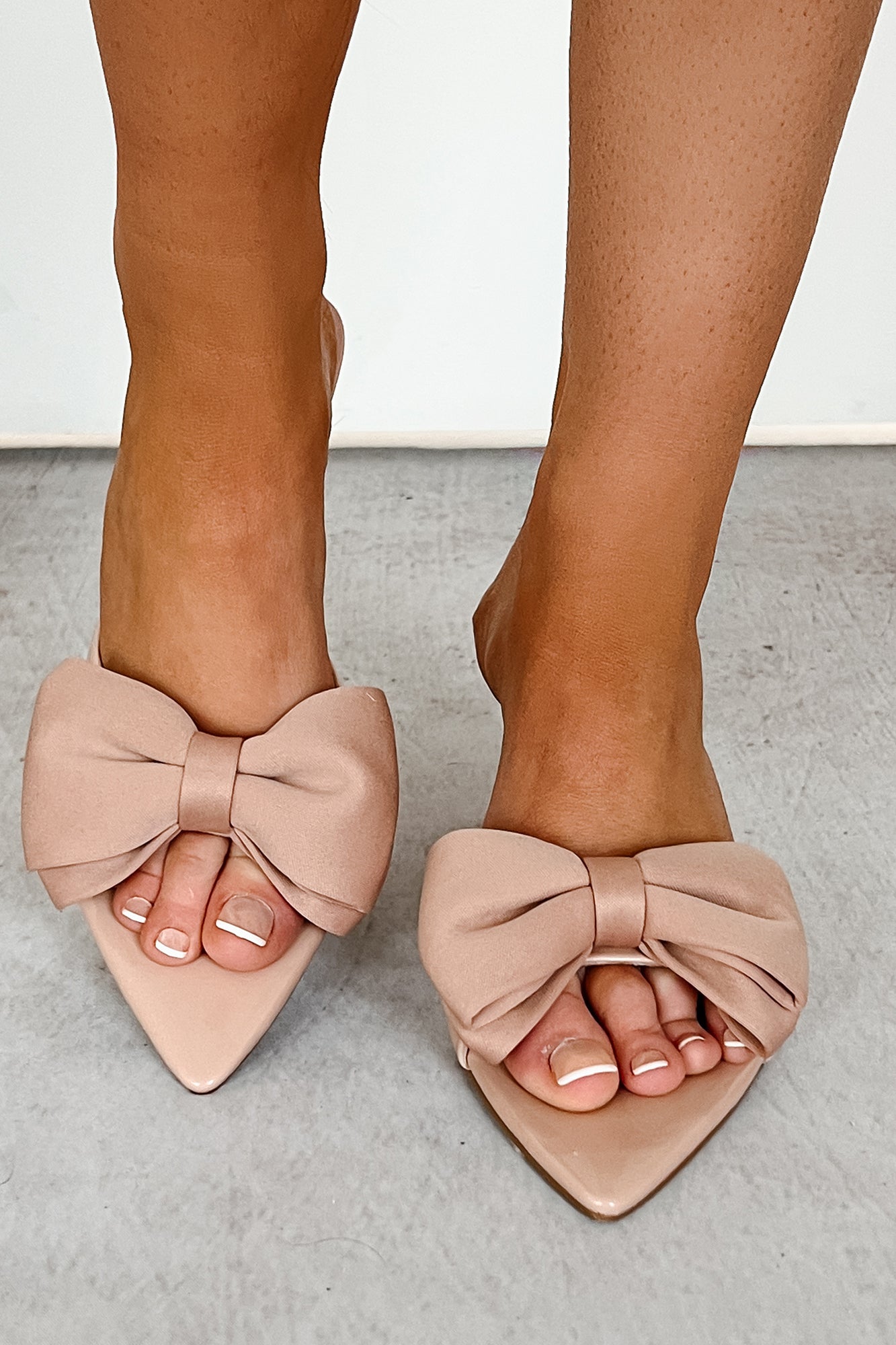 Dainty Steps Pointed Toe Bow Heels (Nude Patent)